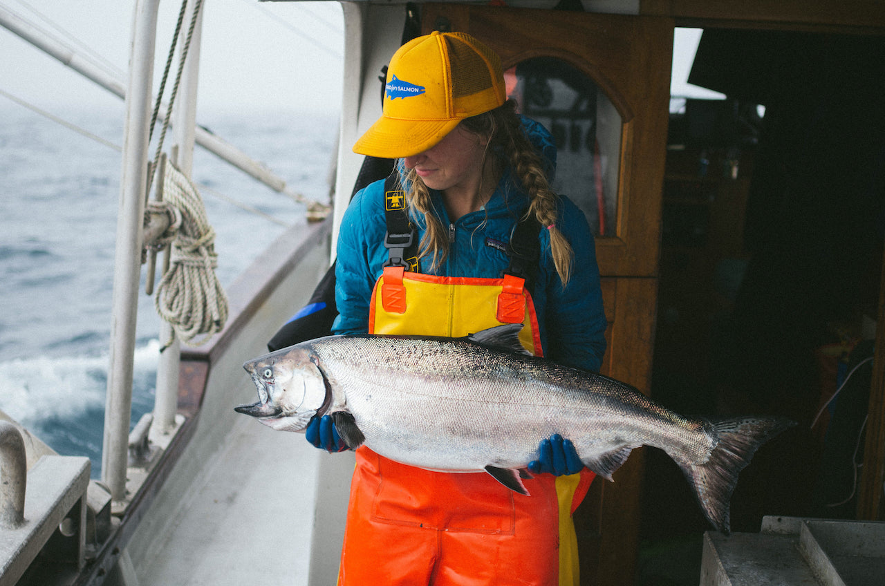 Jessica Robbins, Co-Owner of Fairweather Fish Co. Holding fish on deck
